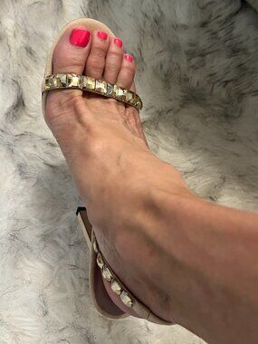 Pale pink crystal embellished slingback Gucci sandals.